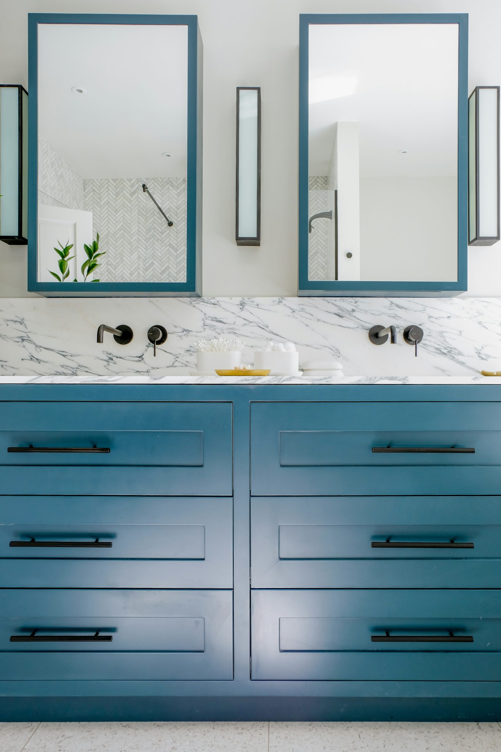 Discover space-saving vanity solutions at Red Door Interiors and Cabinetry. Maximize functionality without compromising style in your compact bathroom. Explore innovative designs and customizable options to create a personalized and efficient sanctuary.
