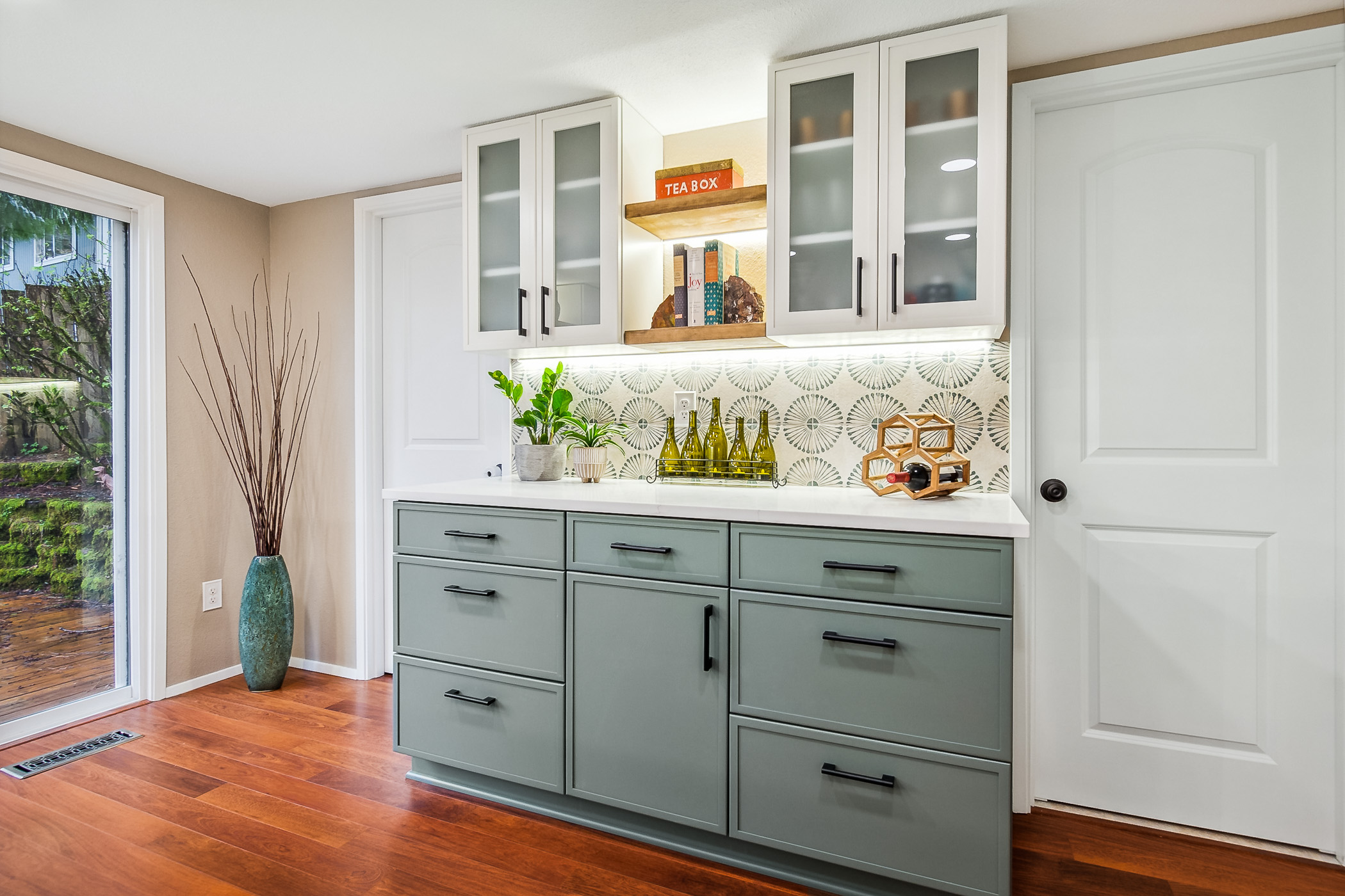 Kitchen Remodel featuring sage green shaker cabinets by Crystal Cabinets