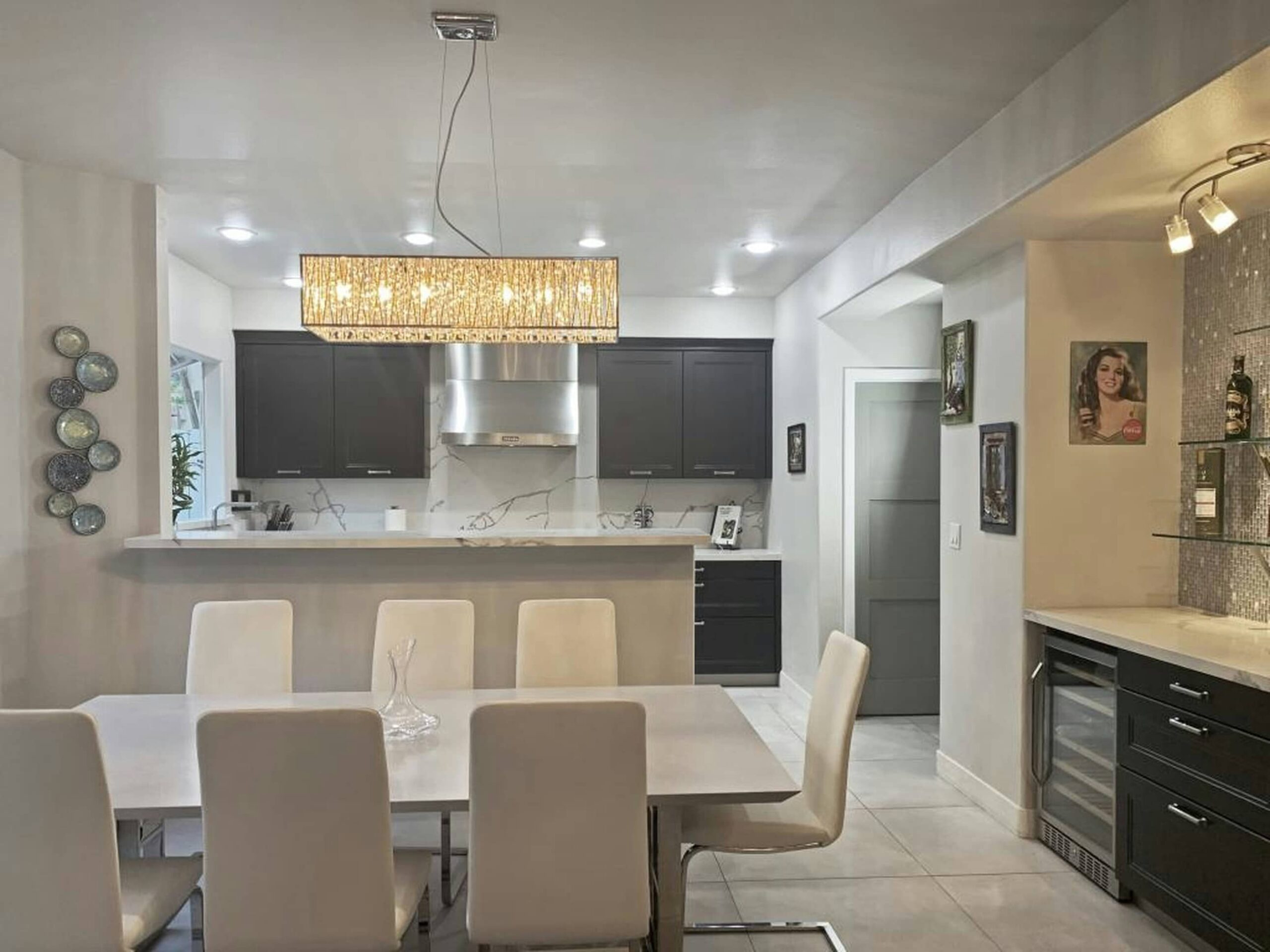 How to Create a Modern Kitchen Design Creating a modern kitchen design involves selecting cabinetry that matches a minimalist aesthetic. Opt for clean lines, geometric shapes, and a variety of finishes. Integrate high-quality appliances and use effective lighting to enhance the space. Modern kitchens balance functionality and style, making them ideal for contemporary home renovations.