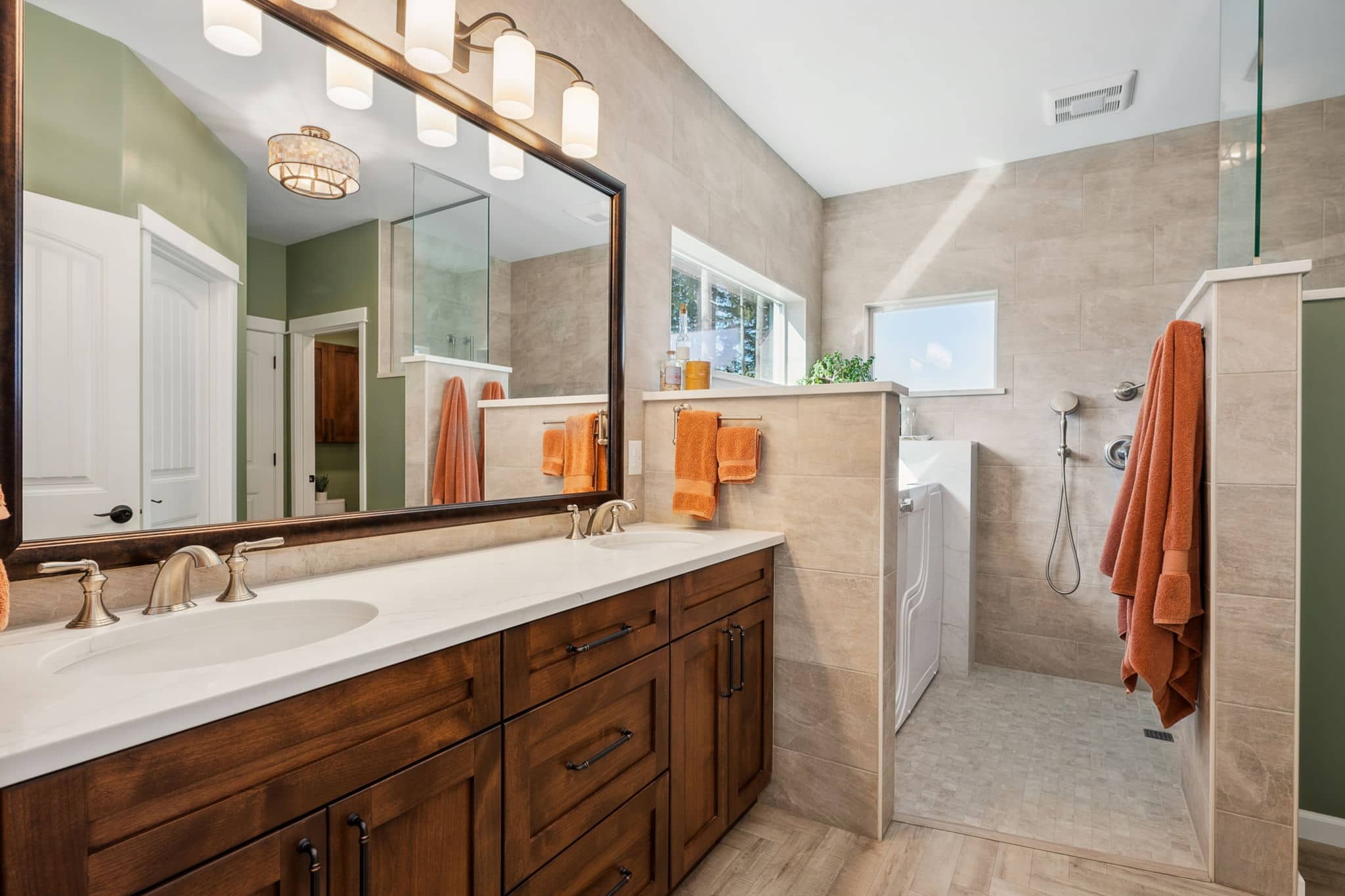 ADA friendly master and primary bathroom with curbless shower and walk-in tub
