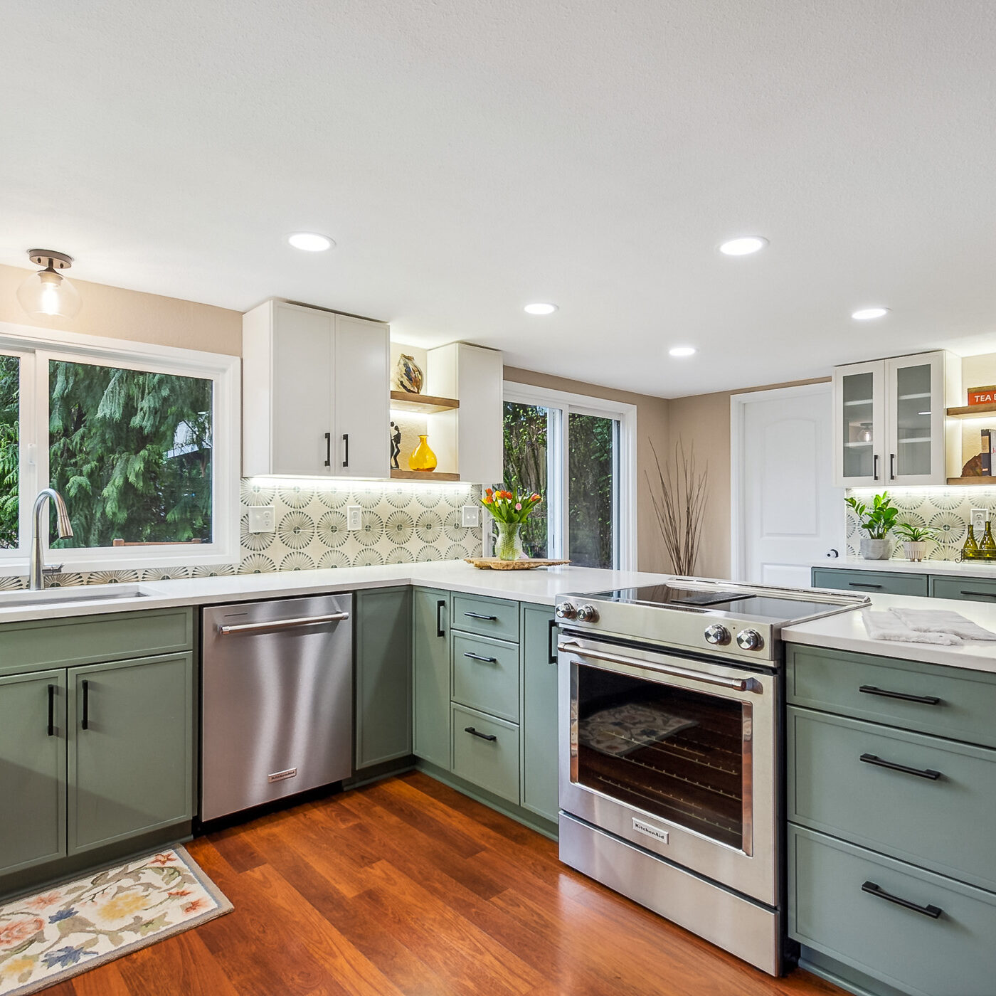 Kitchen Remodel featuring sage green shaker cabinets by Crystal Cabinets